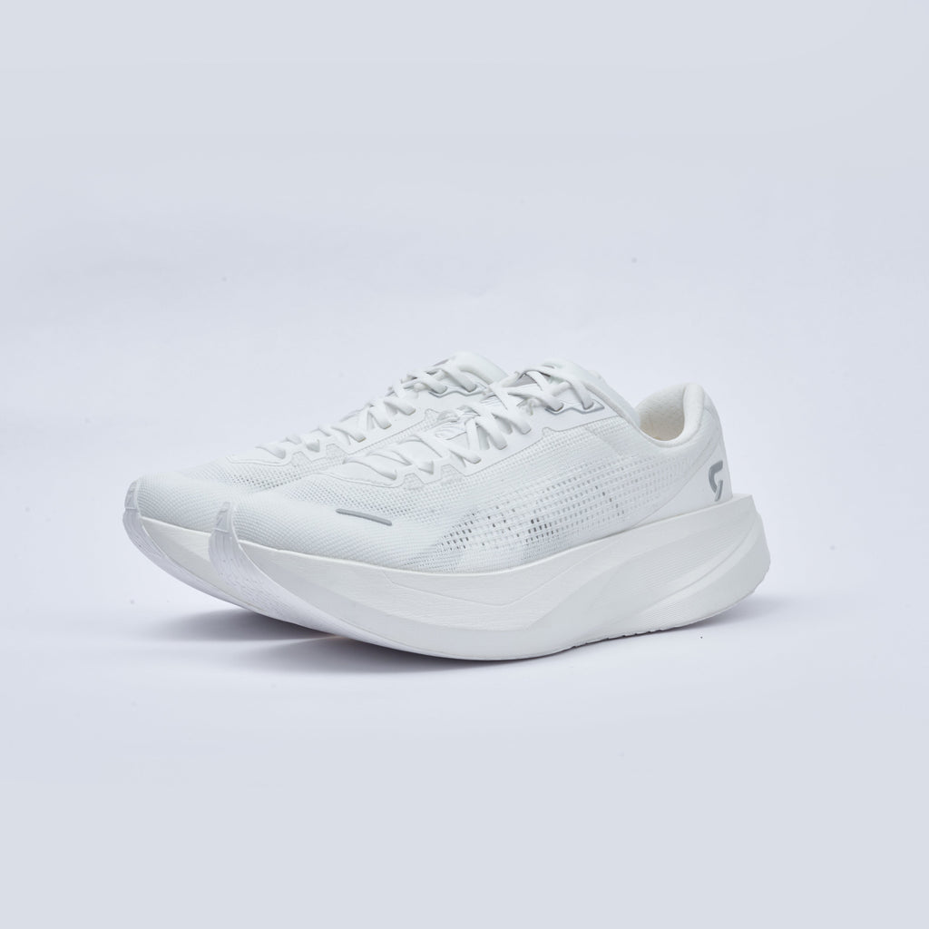White athletic shoe on a light gray background