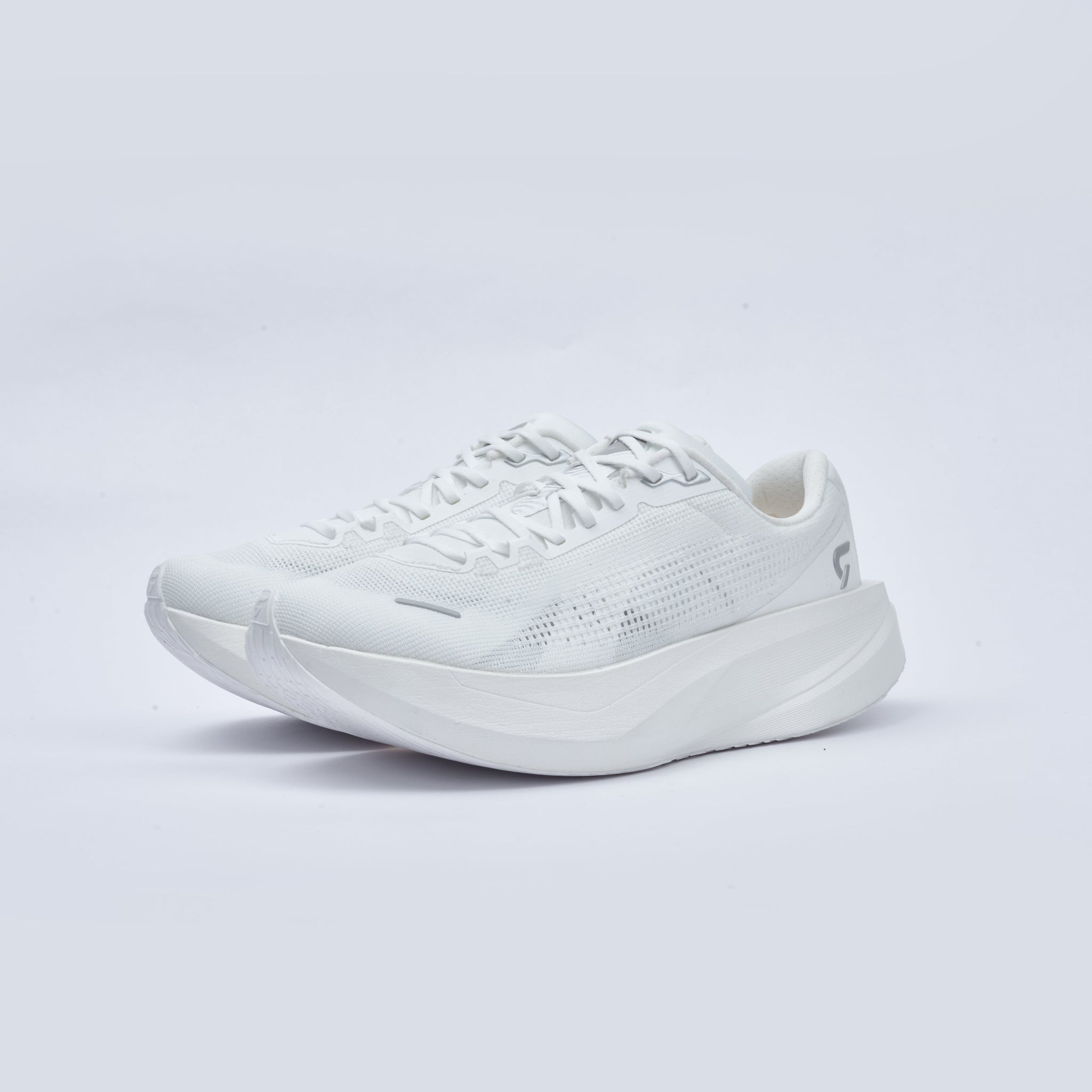 White athletic shoe on a light gray background