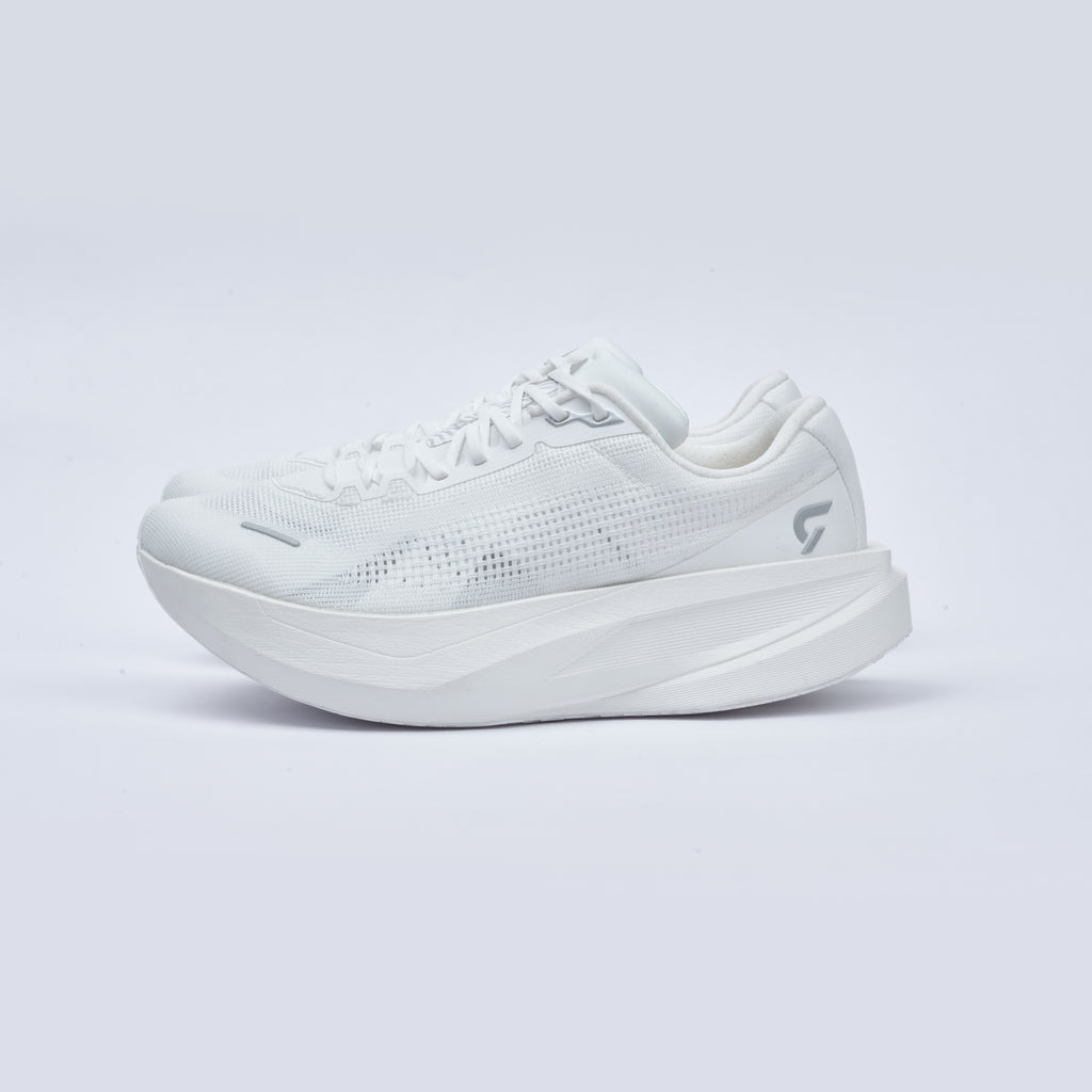 White athletic shoe on a light gray background