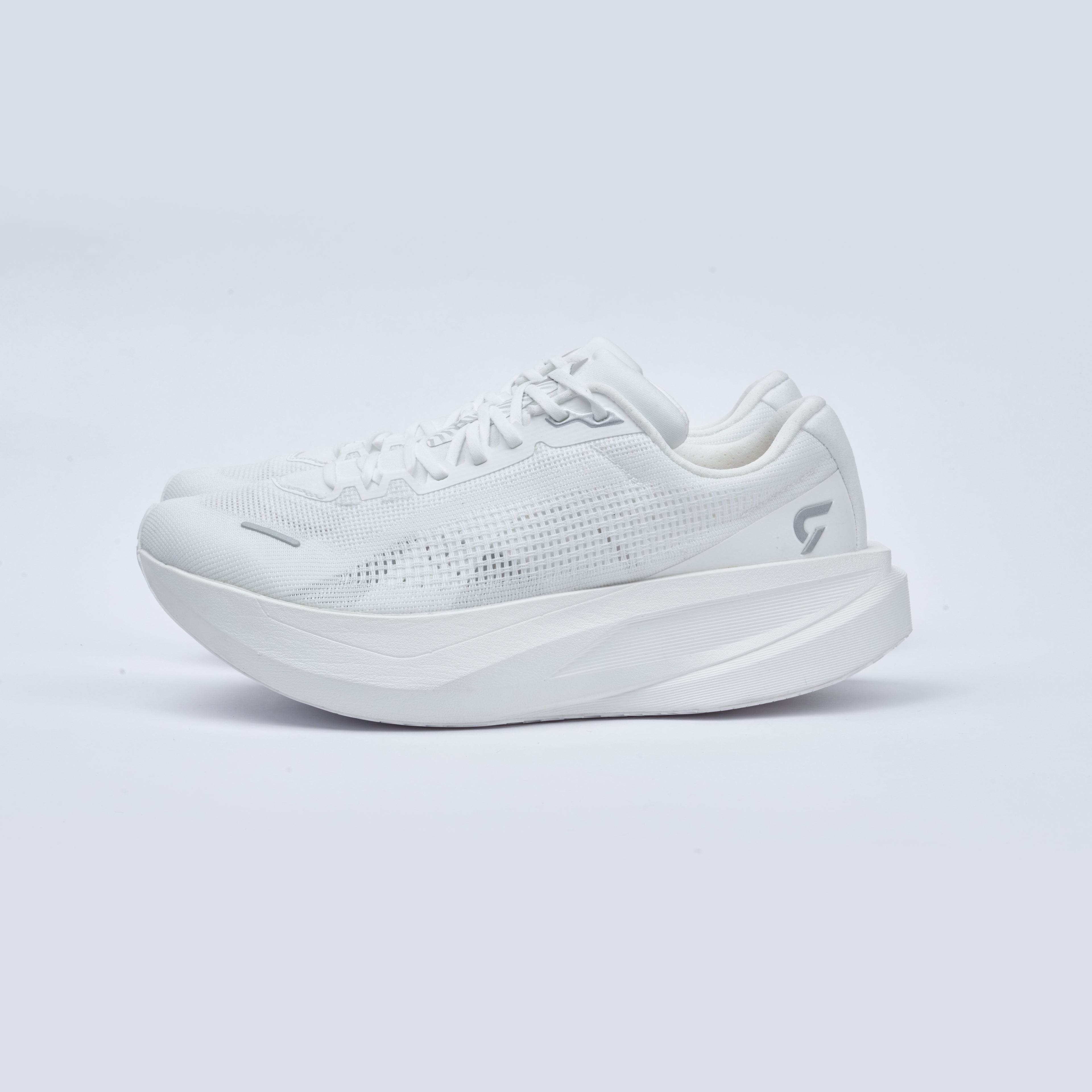 White athletic shoe on a light gray background